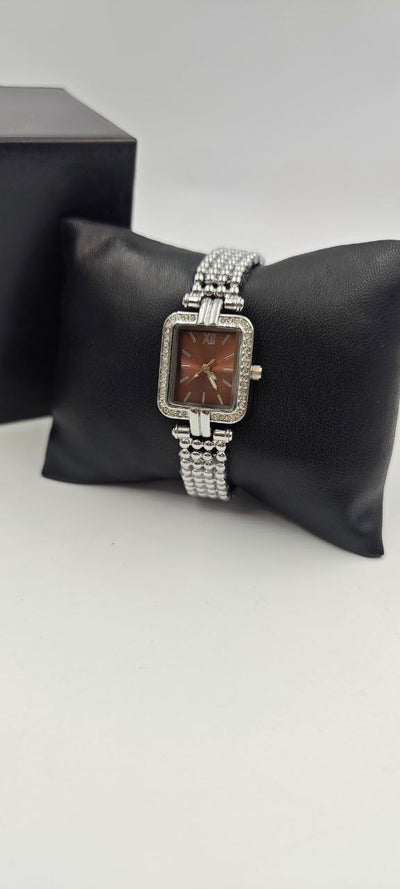 GÜMÜŞ RENK İÇİ TURUNCU BAYAN SAATİ