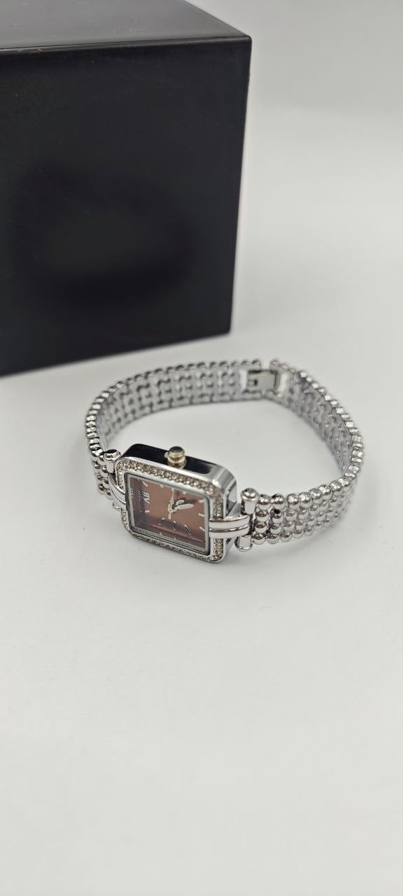 GÜMÜŞ RENK İÇİ TURUNCU BAYAN SAATİ