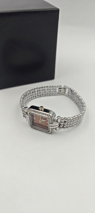 GÜMÜŞ RENK İÇİ TURUNCU BAYAN SAATİ