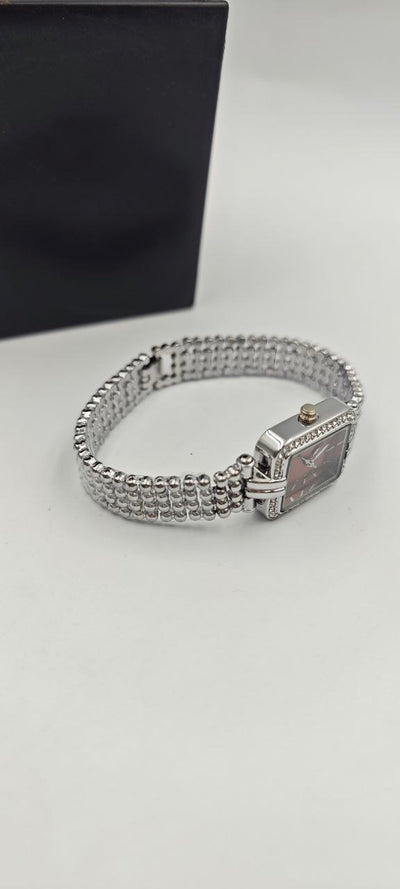 GÜMÜŞ RENK İÇİ TURUNCU BAYAN SAATİ