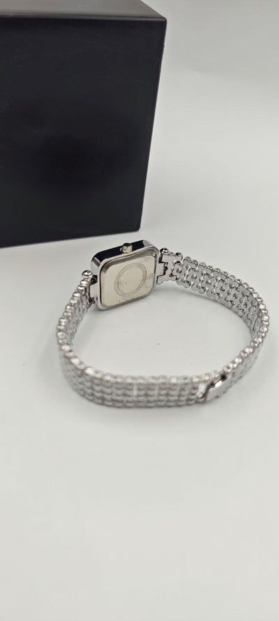 GÜMÜŞ RENK İÇİ TURUNCU BAYAN SAATİ